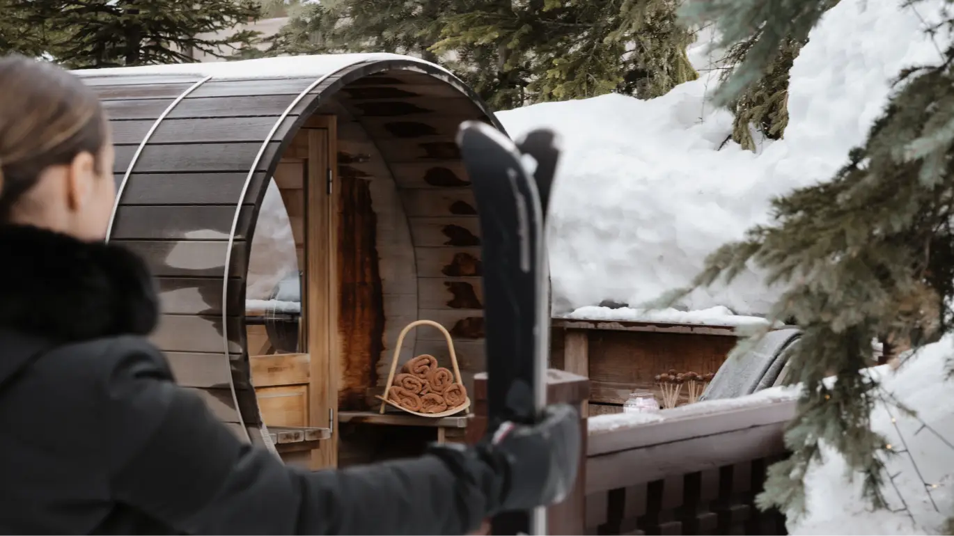 The chalet's outdoor sauna in a snow-covered landscape